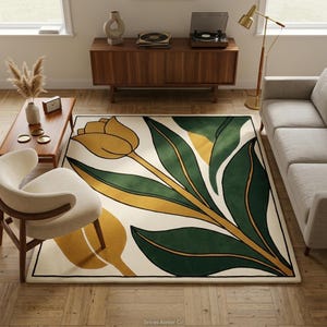 Könnte beinhalten: Ein rechteckiger Teppich mit einer großen, stilisierten gelben Tulpe und langen, dunkelgrünen Blättern auf cremefarbenem Grund. Das Design zeigt kräftige schwarze Umrisse und einen dünnen schwarzen Rand, der die florale Komposition einrahmt.