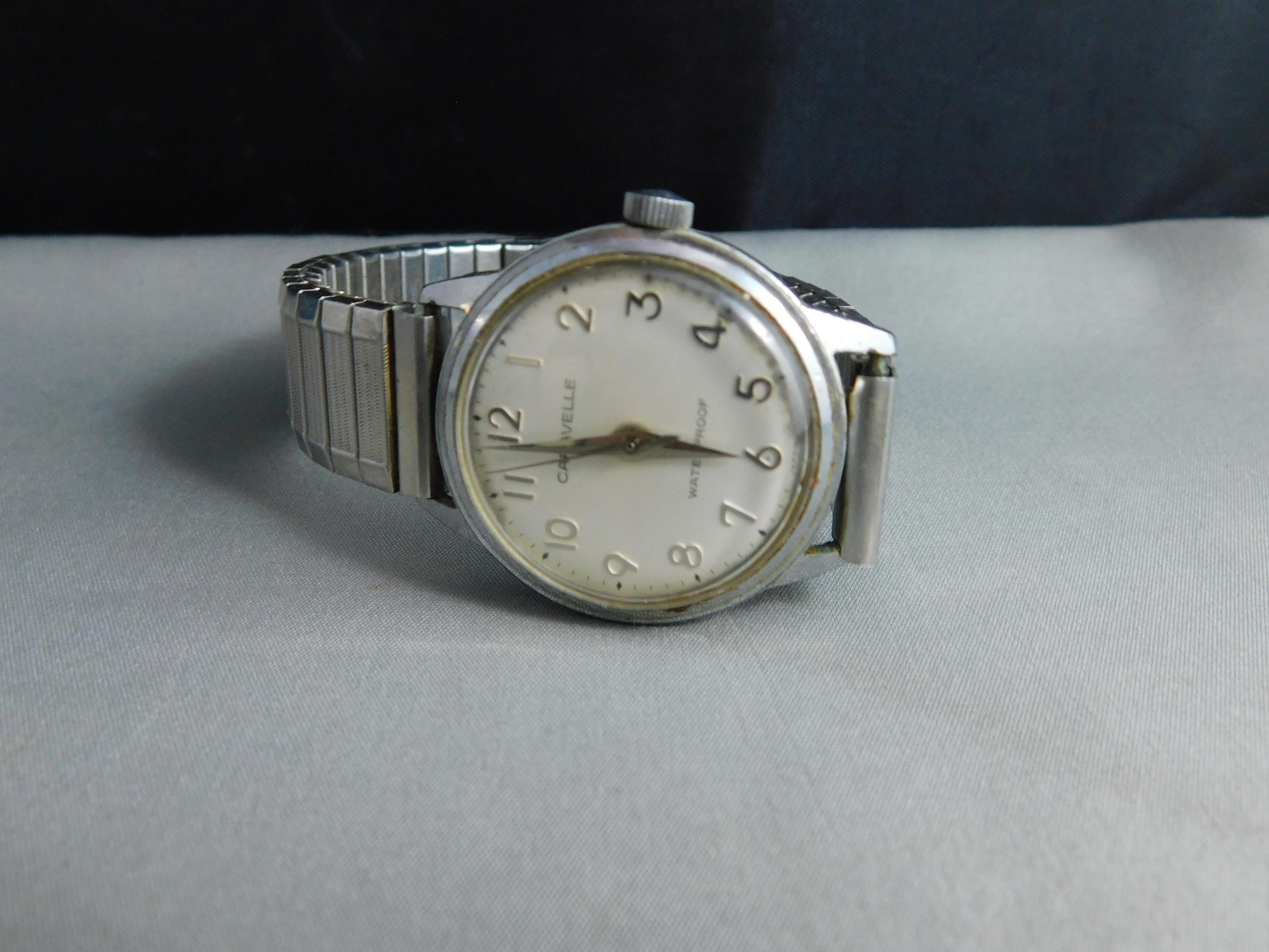 Vintage 1975 Caravelle Watch M9 Water Resistant Silver Tone 30MM Stretch Band Caravelle Silver Wristwatches with Vintage for sale | eBay main image 2