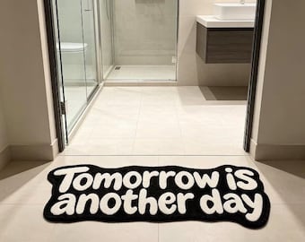 Mañana será otro día – Alfombra en blanco y negro (67" x 28")