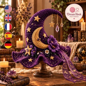 May include: A purple crocheted witch hat featuring a large beige crescent moon, several smaller beige stars, and dark purple fabric flowers. The hat is adorned with dangling gold-tone star charms and a purple crystal pendant, plus long ribbons.