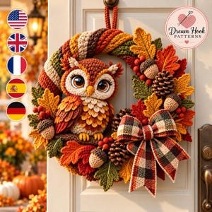 May include: A crocheted autumn wreath featuring a central brown owl, surrounded by orange, yellow, and green crocheted leaves, acorns, pinecones, and red berries. A plaid fabric bow is attached to the bottom right, with the text Dream Hook PATTERNS.