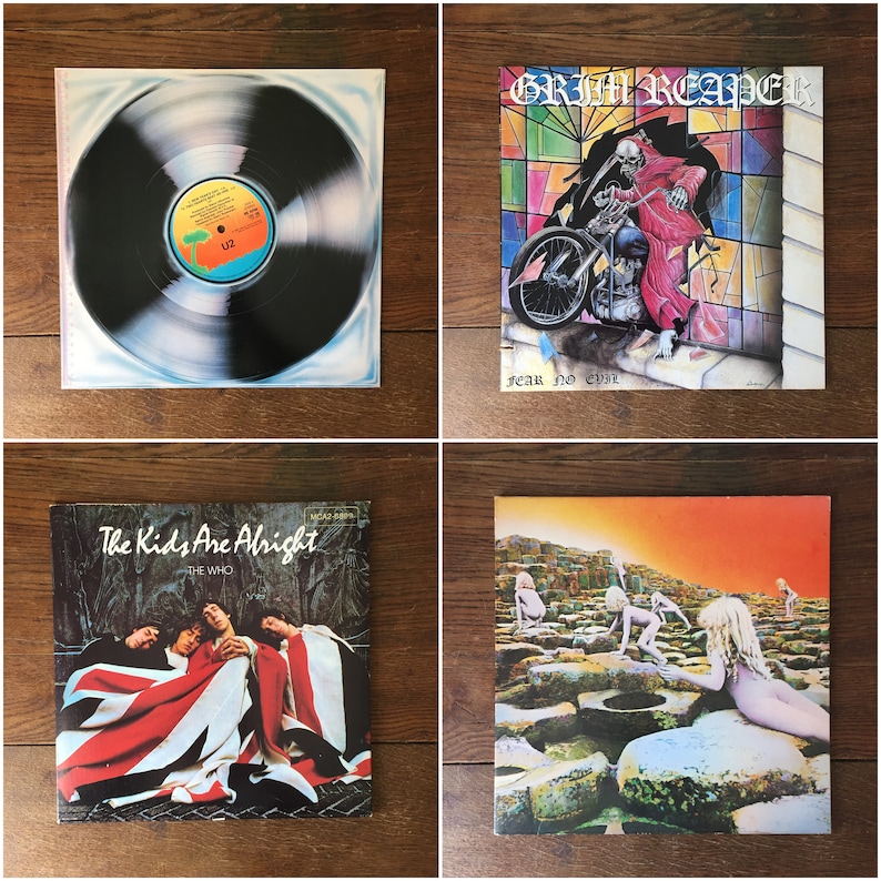 Puede incluir: Cuatro discos de vinilo, incluyendo "The Kids Are Alright" de The Who, "Fear No Evil" de Grim Reaper, y otros dos discos con etiquetas en blanco y negro.