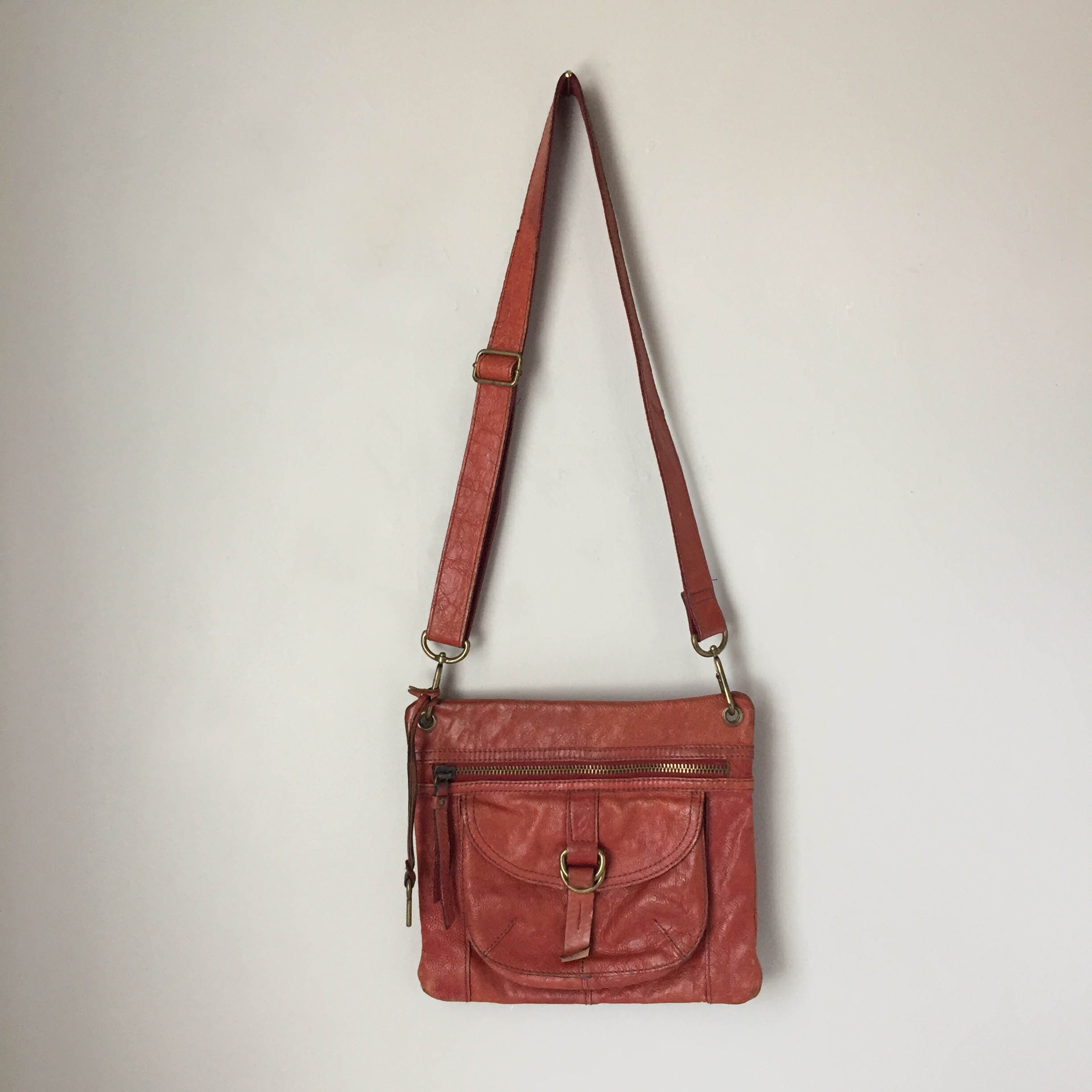 white bolsa with silver hardware