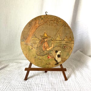 Vintage Round Wood Plaque of Little Boy Fishing with Dog | Whimsical Child&#39;s Room Decor | Mid-20th Century Pyrography Art 8&quot;