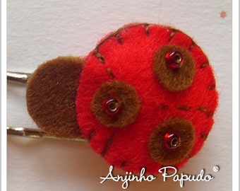 One Ladybug Hair Bobby Pin.