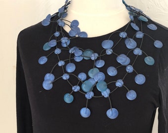Necklace made of latex in different shades of blue