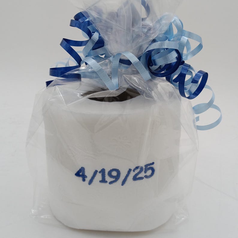 May include: A set of three ceramic mugs with a speckled, matte finish. The mugs are in shades of cream, light gray, and dark gray. Each mug has a simple, minimalist design, perfect for coffee or tea.