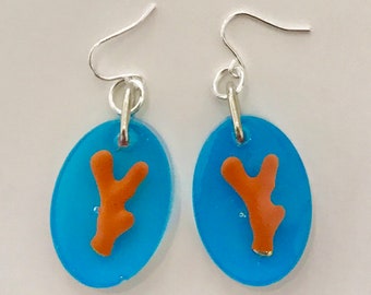 Faux Coral branch in resin earrings.