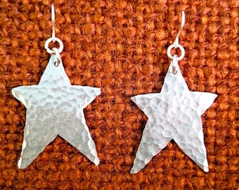 Silver Big Star Ear rings.
