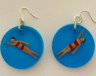 Swimmers in resin earrings.