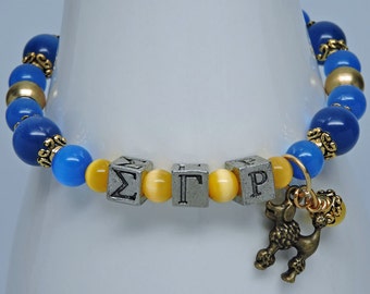 SIGMA GAMMA RHO 8" Beaded Bracelet with Sorority Greek Letters Brilliant Blue Gold Poodle