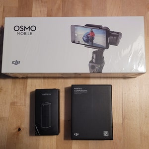 DJI OSMO Mobile - New - Complete with accessories and second battery