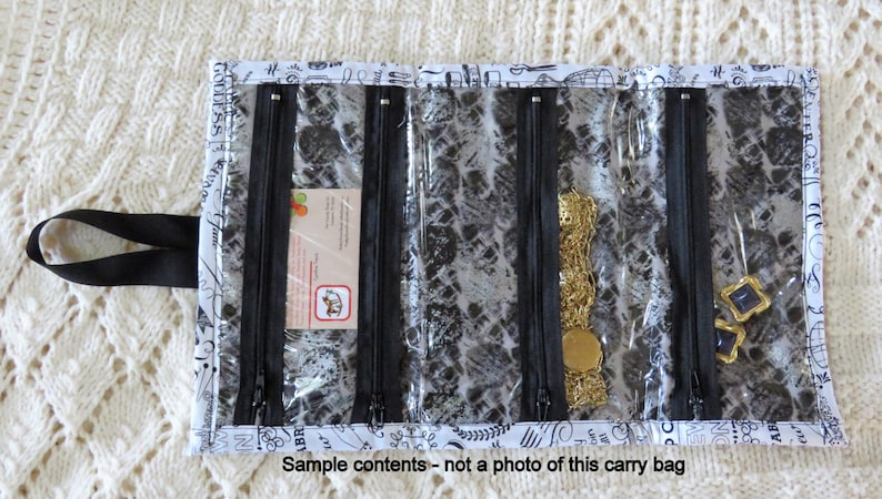 with 4 inside see through zippered pockets. Jewelry Craft Caddy