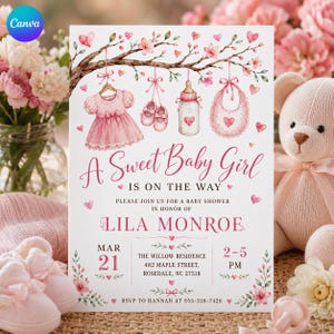 May include: A white baby shower invitation card featuring a brown tree branch with hanging pink baby clothes, shoes, a bottle, and a bib. The text reads A Sweet Baby Girl IS ON THE WAY, honoring Lila Monroe on March 21 at 2-5 PM at The Willow Residence.