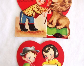 2 San Valentín vintage: Tarjeta A-Meri-Card plegable de los años 50 - Niño con maletas, domador de leones con león