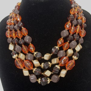 Collana di perline vintage: perline di plastica a 4 fili anni &#39;50 oro marrone arancione W Germania