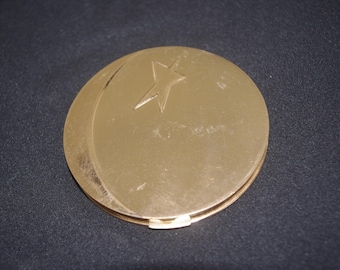 Polvos compactos vintage: "Dorothy Gray" dorados "Luna Nueva y Estrella" años 60/60