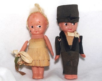 Celluloid "Kewpie" Bride & Groom Dolls Painted w/ Crepe Paper Clothing 1920s