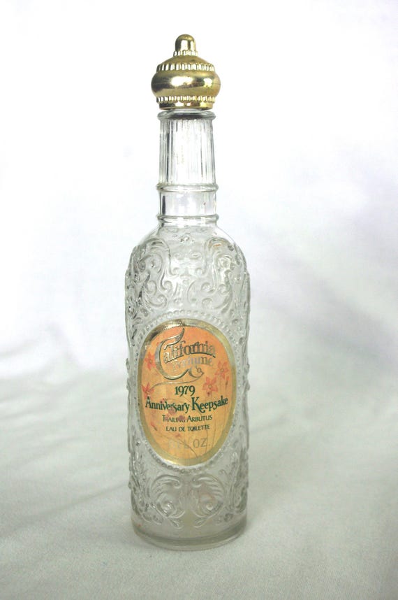 Vintage Perfume Bottles: 70s Avon, Both "California Perfume Co." Trailing Arbutus Eau de Toilette, 1979 / 90th Anniversary, 1976 View 3