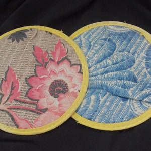 Two Vintage Pot Holders / Hot Pads: Fabric & Yellow Oil Cloth