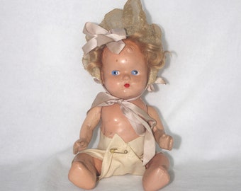 Vintage Composition Doll: Jointed Sitting Girl, w/ Blue Eyes & Hat Wig, 1940s