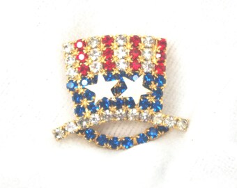 Broche/pin vintage: Sombrero de copa patriótico/del Tío Sam con diamantes de imitación rojos, blancos y azules