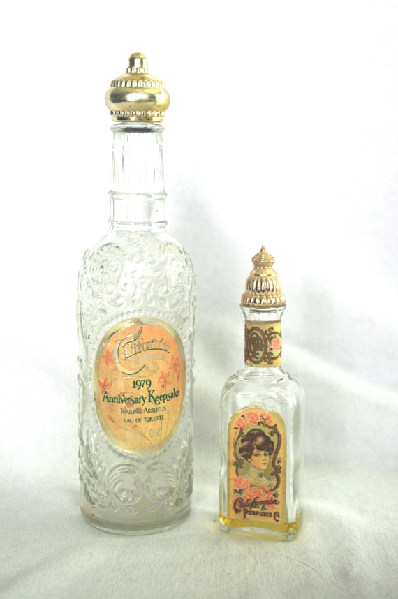 Vintage Perfume Bottles: 70s Avon, Both "California Perfume Co." Trailing Arbutus Eau de Toilette, 1979 / 90th Anniversary, 1976