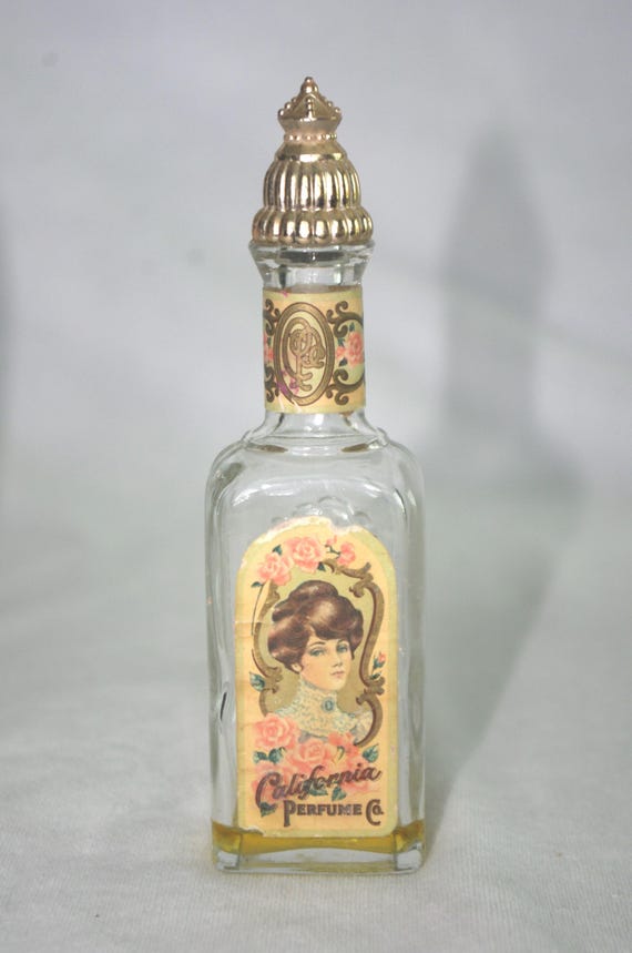 Vintage Perfume Bottles: 70s Avon, Both "California Perfume Co." Trailing Arbutus Eau de Toilette, 1979 / 90th Anniversary, 1976 View 5