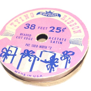 Vintage Bandspule: Rosa, 1960er Jahre, Krönchen, "Bindeband"