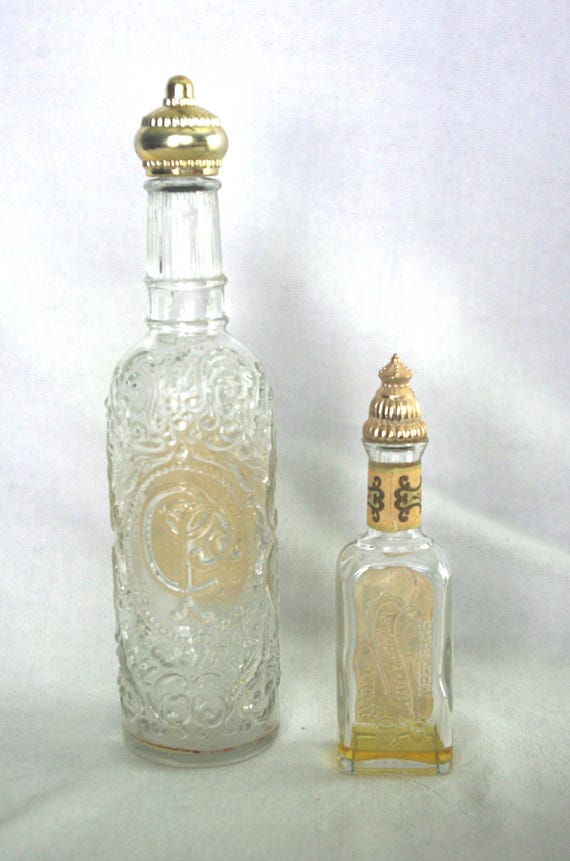 Vintage Perfume Bottles: 70s Avon, Both "California Perfume Co." Trailing Arbutus Eau de Toilette, 1979 / 90th Anniversary, 1976 View 2