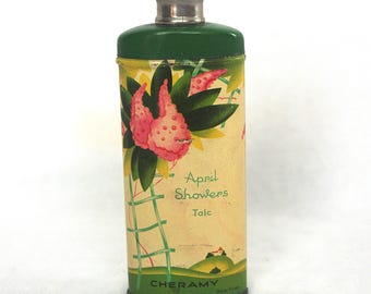 Lata de polvos vintage: Pequeña "April Showers Talc" color cereza, verde y beige con flores rosas, década de 1940.