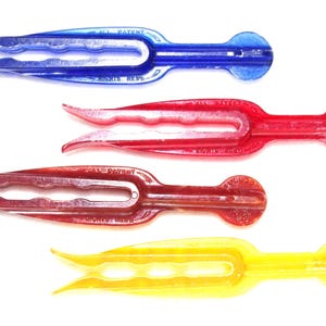 4 Vintage Clothespins: Hard Plastic 1950s-1960s, Mastro / Bulldog, Clear Yellow, Red, Blue / Marbled Brown