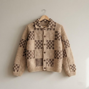 May include: A long-sleeve crochet cardigan featuring a patchwork design of alternating solid beige squares and brown and beige checkered squares. The garment includes a collared neckline, a front button closure with five brown buttons, and ribbed cuffs.