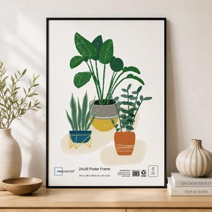 May include: A 24x36 inch poster frame featuring a botanical illustration of three potted plants. The artwork displays a large plant in a grey and yellow pot, a snake plant in a blue stand, and a small plant in a terracotta pot on a white background.