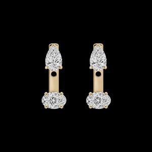 May include: A pair of gold earrings featuring a vertical bar design. Each earring has a pear-shaped diamond at the top and an oval-shaped diamond at the bottom, both set in gold prongs. The diamonds are clear and faceted, reflecting light against the black background.