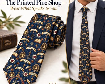 May include: A dark blue necktie featuring a repeating pattern of gold and white religious symbols, including crosses, open books, quills, and banners with the text Sola Fide, Sola Scriptura, Sola Gratia, and 1517. The tie is worn with a white shirt.