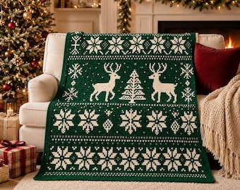 May include: A dark green knit throw blanket featuring a repeating cream-colored pattern of reindeer, pine trees, and large snowflakes. The textile design includes horizontal bands of geometric shapes and intricate floral-like snowflake motifs.