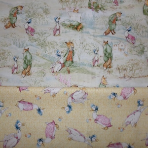 May include: Two fabric patterns featuring illustrations of anthropomorphic animals. The top fabric has a light blue background with foxes and ducks in clothing. The bottom fabric has a yellow background with ducks wearing bonnets and pink dresses.