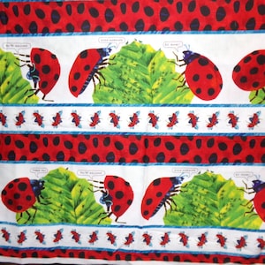 May include: A fabric with a repeating pattern of red ladybugs with black spots, green leaves, and red and black dotted stripes. The ladybugs are interacting with each other, with speech bubbles that say "Thank you" and "You're welcome".