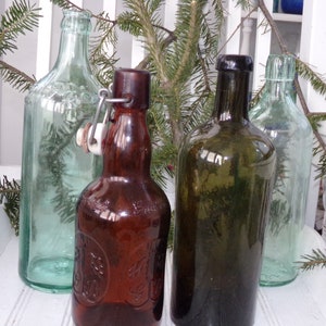 Set of 4 Antique Bottles .   Vintage Beer Bottle . Medicine Bottles .Wedding Decor.  Decorative Bottles . Rustic House Bottles .Beer  Bottle