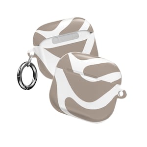May include: A protective case for wireless earbuds featuring a wavy, abstract pattern in white and taupe. The case includes a silver-toned metal ring attachment on the side, designed for clipping onto items, and has a smooth, glossy finish throughout.