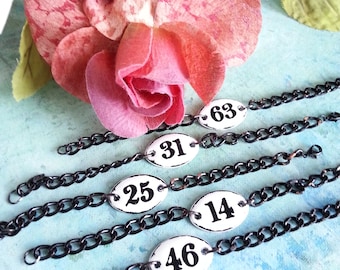 stackable bracelets,number bracelets,upcycled bracelets,black and white enamel numbers,black and white enameled number bracelets,bracelets