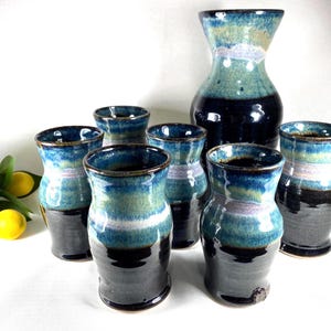 7 Piece Stoneware Pottery Set: hand thrown cups and carafe, vintage.