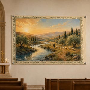 May include: A rectangular wall tapestry featuring a landscape painting of a winding river at sunset. A shepherd walks along the bank with a small flock of sheep. The scene includes olive trees, rolling hills, and a decorative leaf-patterned border.