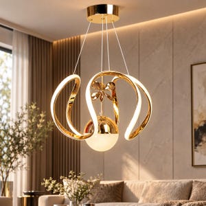 May include: A gold-finished chandelier featuring a central sphere with a textured white glass base, topped by a small flower-shaped ornament. Three curved, illuminated arms extend outward from the center, suspended by thin wires from a circular canopy.