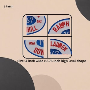 May include: An oval-shaped embroidered patch measuring 10.16 cm wide by 6.99 cm high. The patch features white, blue, and red thread with text including 67, SKI, HILL, RALPH, USA, DOWN, and LAUREN. The design is divided into four distinct quadrants.