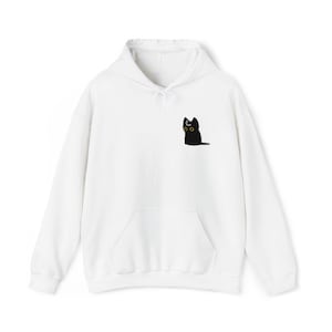 May include: A white long-sleeve hooded sweatshirt featuring a small black cat graphic on the left chest. The cat has large yellow eyes and a white loading icon on its forehead. The hoodie includes a front kangaroo pocket and matching drawstrings.
