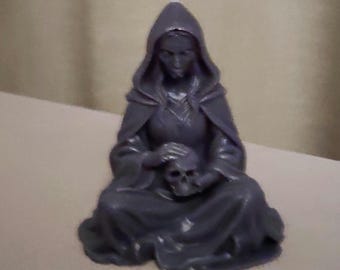 Halloween candle witch with skull