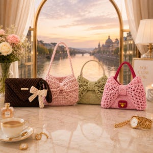 May include: A collection of four crochet bags: a dark brown envelope clutch with a small bow charm, a light pink handbag with a large bow, a sage green handbag with a bow, and a bright pink handbag with a large bow and a handmade label.