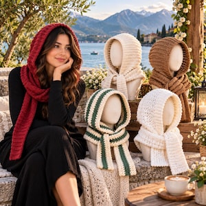 May include: A collection of five hooded scarves featuring various colors and textures. One is deep red, one is cream, one is brown, one is white, and one is cream with dark green stripes. Each scarf includes an integrated hood and long ends.